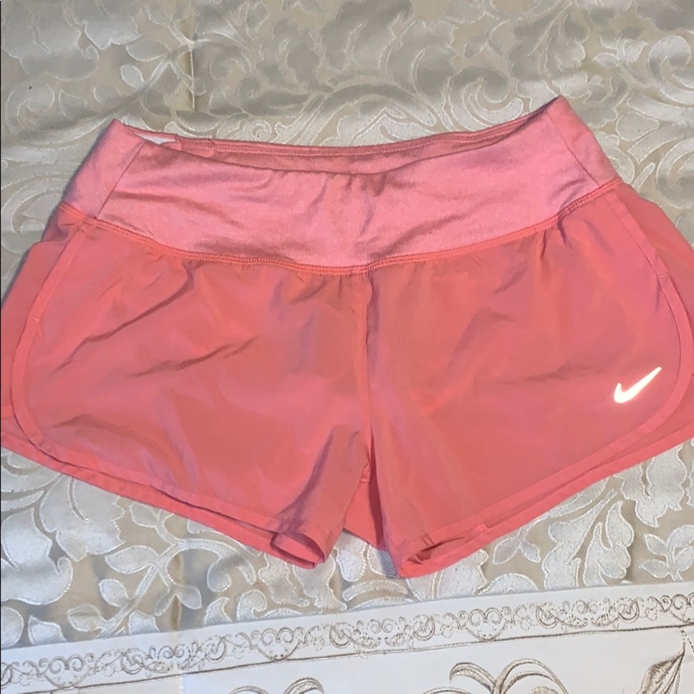 Nike running shorts in coral color size small